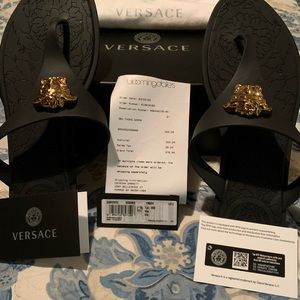 Versace  Slides Black size 8 in excellent condition only worn once